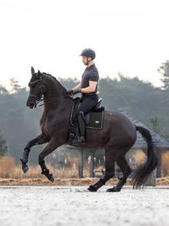 LeMieux Puissance Suede Dressage Square Black 9 LeMieux Puissance Suede Dressage Square Black -Equestrian Supply Store it03808 lifestyle puissancesuededressagepad black 17 3x4